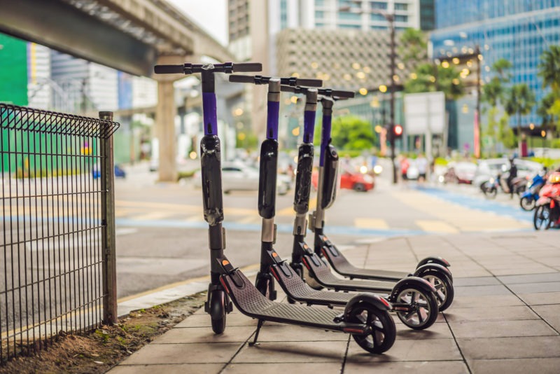 escooters lined up - staying safe on an electric scooter and scooter injuries - viles and beckman - fort myers florida