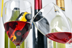Model car soaked in wine glass
