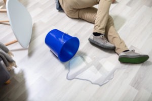 man-slips-and-falls-on-wet-floor