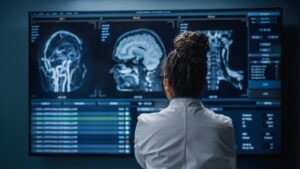 a-doctor-looking-at-the-brain-scan-of-a-suspected-traumatic-brain-injury-victim