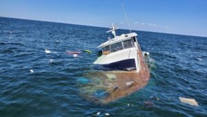A boating accident lawyer helps file an insurance claim for a sunken boat.