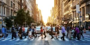 A crowd of pedestrians walks on a busy crosswalk. Can I pursue a claim after an accident with a pedestrian?