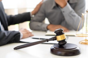 Fort Myers wrongful death lawyer consoling grieving client during a case consultation after experiencing sudden loss.