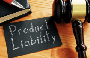 Chalkboard and gavel. Learn what products and services are covered under product liability law.
