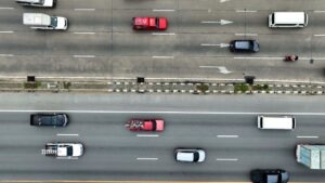 An overhead shot of a busy highway. Is Lane Splitting Legal in Florida?