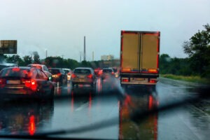 Severe weather on the highway and bad driving conditions. How is fault determined in a multi-vehicle truck accident?