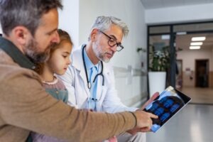 A doctor is explaining the results of an MRI scan to the father of a young girl, and the father is thinking, how long do I have to file a child injury claim?