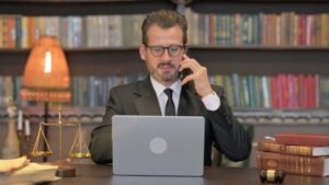 An attorney helps his client understand the answer to the question, “Can I recover lost wages after a rideshare accident?